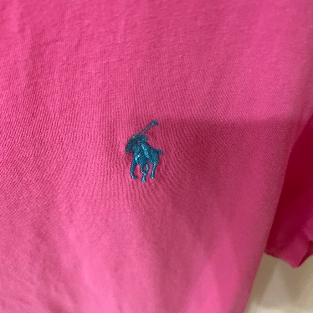 Women’s pink polo shirt